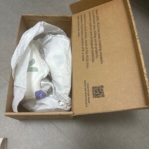 Brand new Veja kid size 12